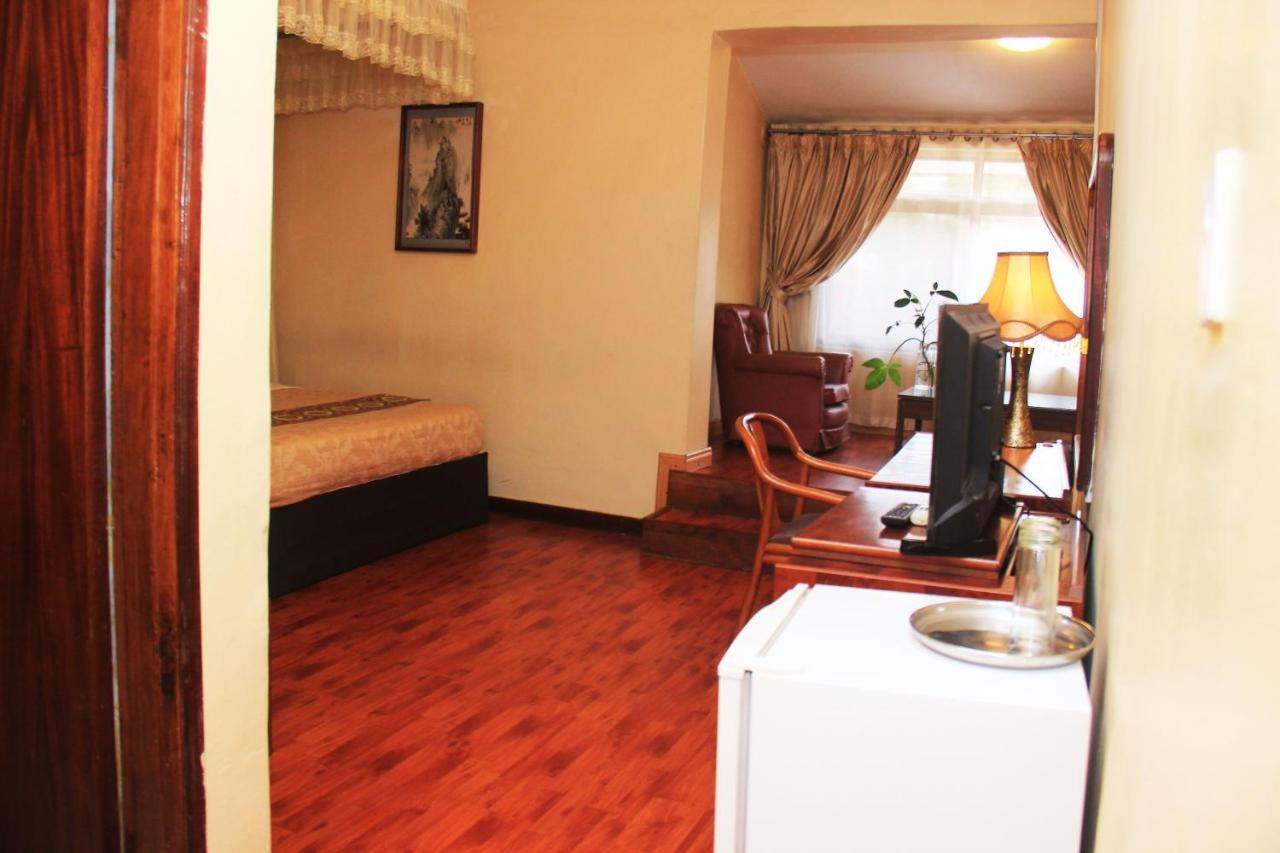 Fang Fang Hotel Кампала Экстерьер фото